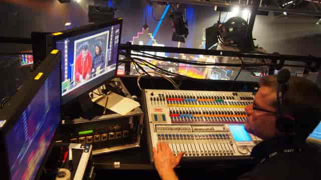 Live event production in The Fuse auditorium with audio-visual setup for seamless execution.