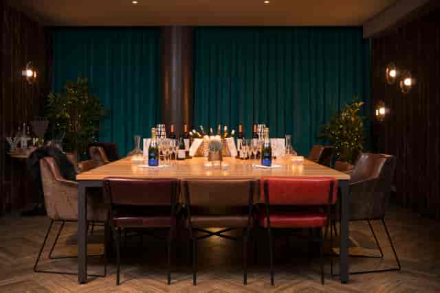 Private dining room at The Refinery City Point, elegant setup for intimate gatherings.