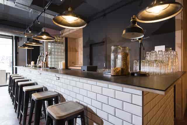 Modern bar area in Autumn Yard, ideal for networking events and pre-dinner drinks.