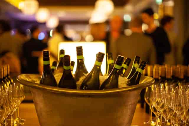 Stylish ice bucket with chilled wine at St Pancras Brasserie for elegant events.