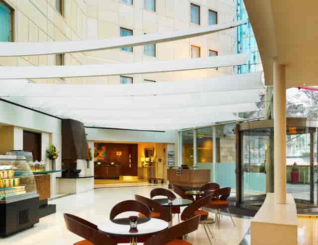 Modern lobby at London Marriott Kensington, ideal for networking events and meetings.