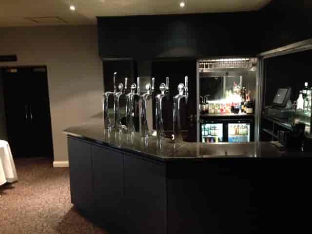 Sleek bar at The Velasco, Great Victoria Hotel, perfect for elegant events and networking.