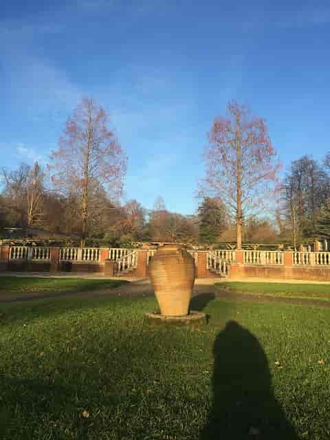 Italian Garden in Cannizaro Park with decorative urn, ideal for weddings and events.