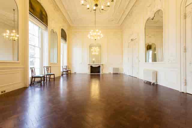 Elegant Music Room with high ceilings, perfect for upscale events and gatherings.