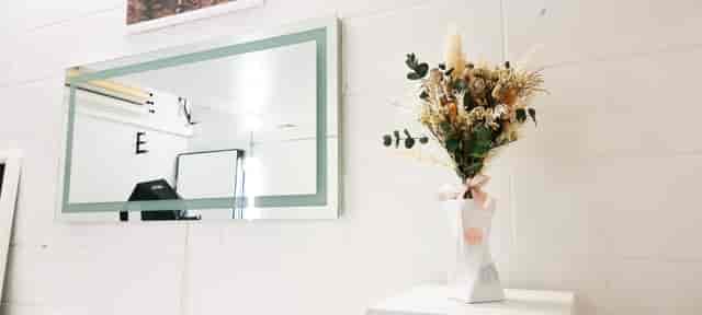 Stylish floral arrangement in modern workshop studio for events and meetings.
