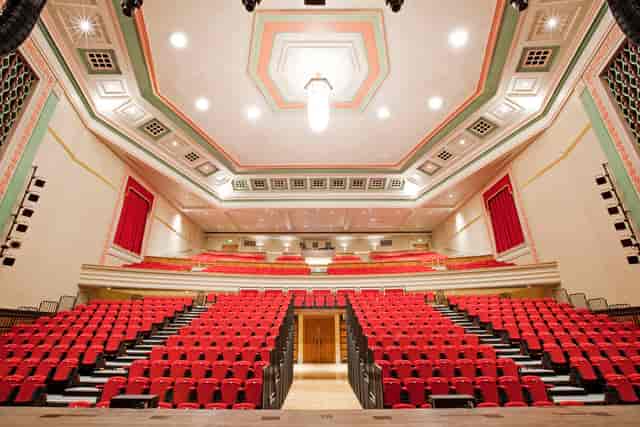 Great Hall Theatre with tiered seating, ideal for conferences and live events.