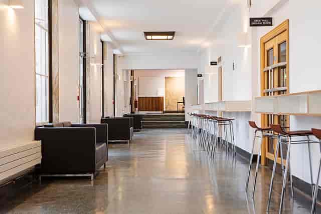 Great Hall Theatre corridor with sleek furniture, ideal for networking events.
