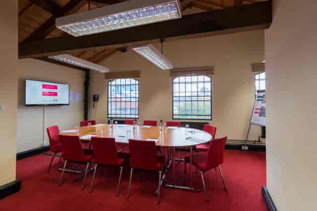 Randall Room at IET Birmingham: round table meeting space for workshops and collaboration.