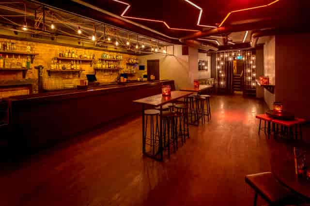 Stylish dimly lit venue at The Basement, perfect for networking events and gatherings.