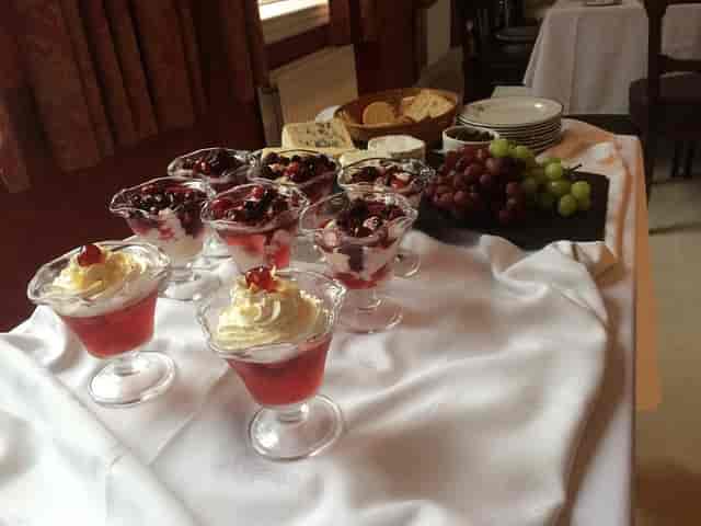 Elegant dessert display with parfaits and cheese at St Pauls Club for events.