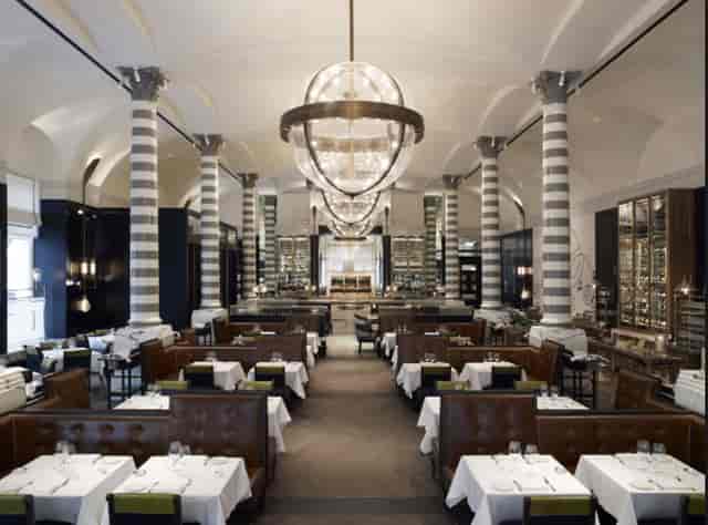 Elegant Massimo Restaurant at The Corinthia, ideal for upscale events and gatherings.