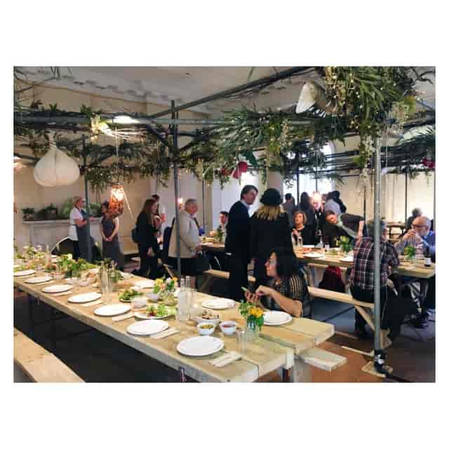 Event space at The Lancaster Rooms with floral centerpieces, perfect for networking events.