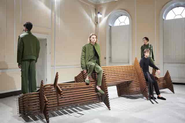Contemporary fashion presentation at The River Rooms, Somerset House with stylish models.