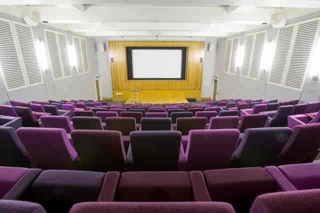 Henry Wellcome Auditorium with tiered seating, ideal for conferences and presentations.
