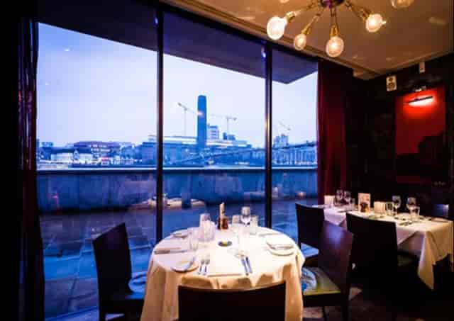 Private dining at Northbank Restaurant with elegant table setting and skyline view