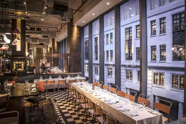 Exclusive hire at Bread Street Kitchen, St Paul's - elegant table for events and gatherings.