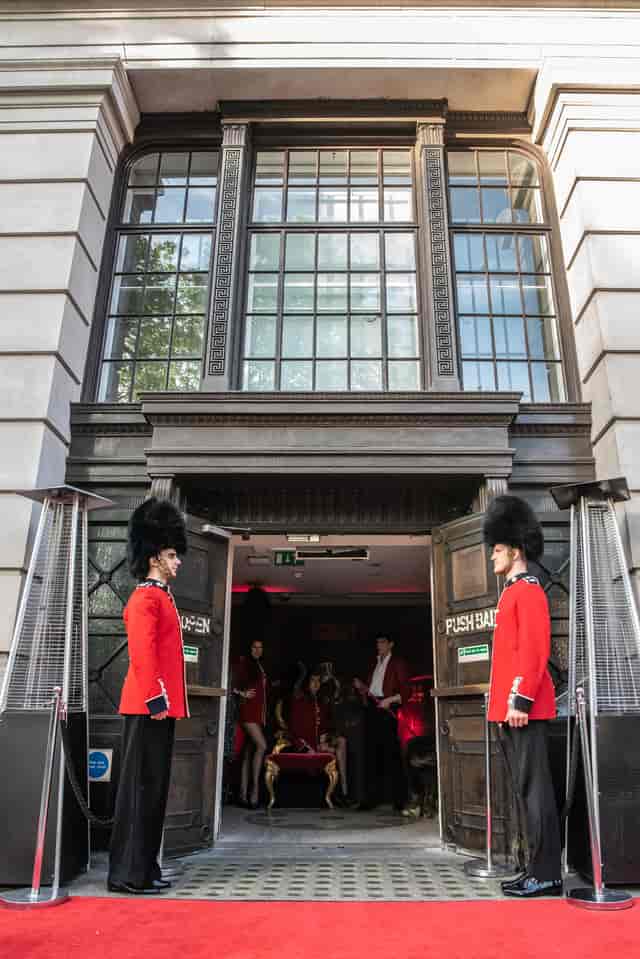 London Cabaret Club entrance with guards, ideal for upscale events and gatherings.