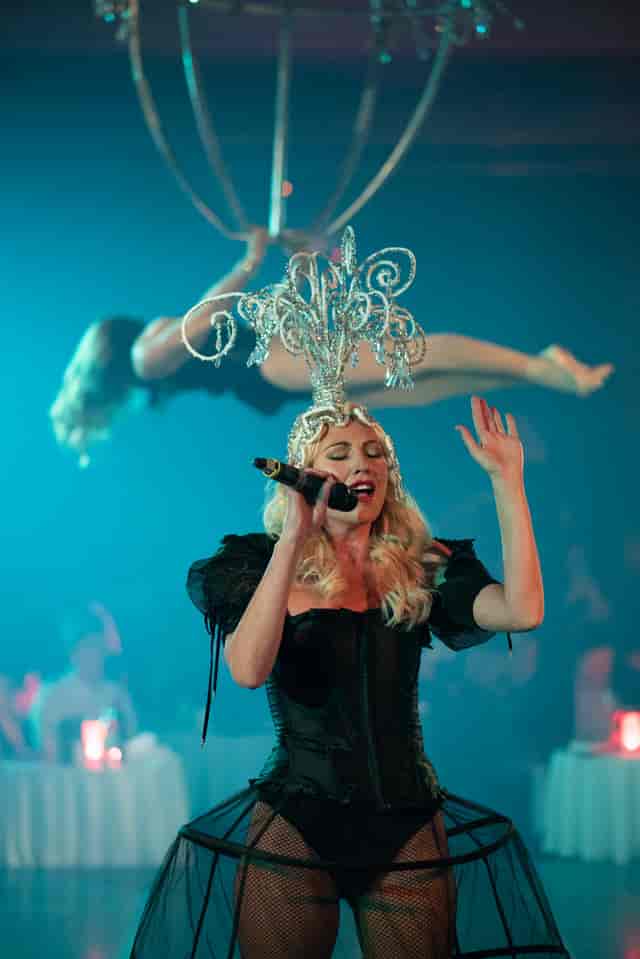 London Cabaret Club performance with singer in chandelier headpiece at Bloomsbury Ballroom.