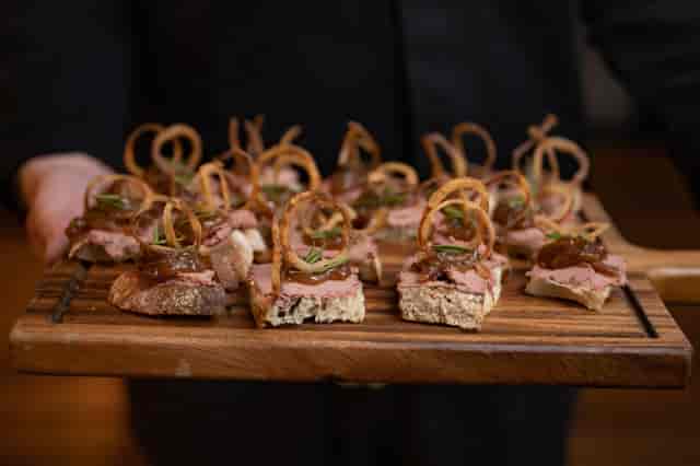 Gourmet hors d'oeuvres platter in The Trafalgar Room for upscale networking events.