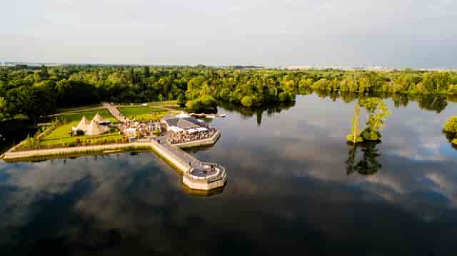 Scenic Amber Lakes venue with lush greenery, perfect for outdoor weddings and events.