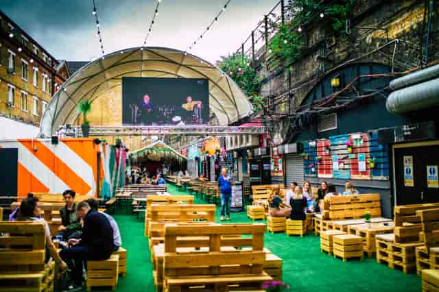 Vauxhall Street Food Garden with vibrant seating and greenery for casual events.