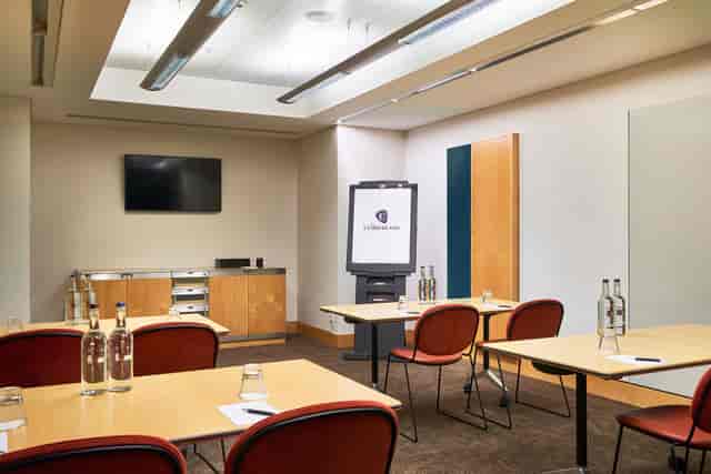 Modern meeting room in The Cumberland Hotel, ideal for corporate workshops and events.