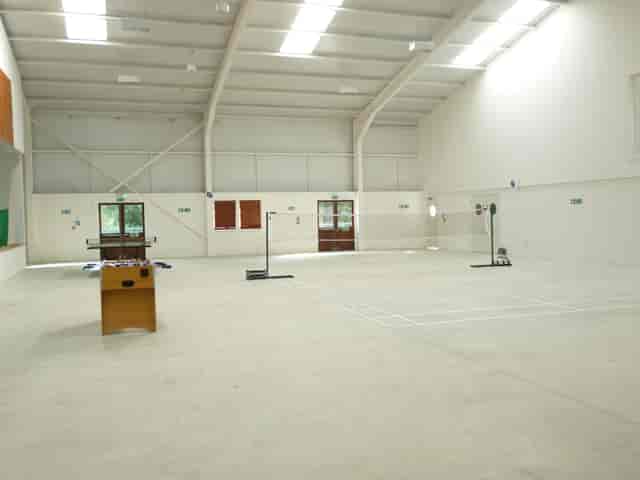 Spacious Sports Hall in Deanwood Barn, ideal for meetings and events with natural light.