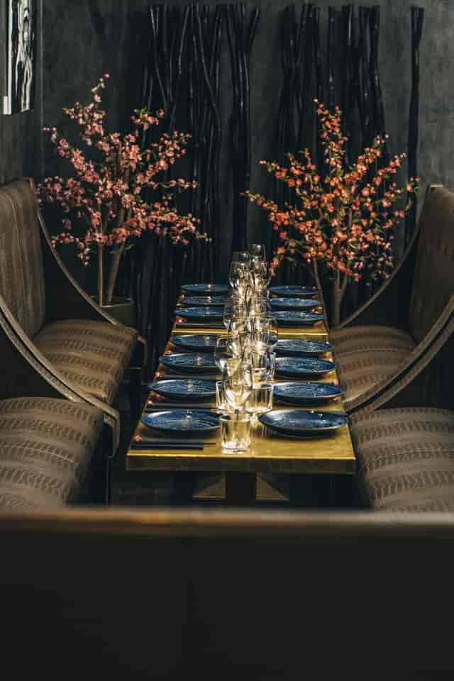 Elegant dining table in The Inner Sanctum, perfect for sophisticated events and gatherings.