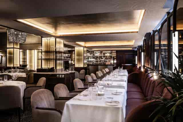 Elegant dining space at Savoy Grill, perfect for upscale events and meetings.