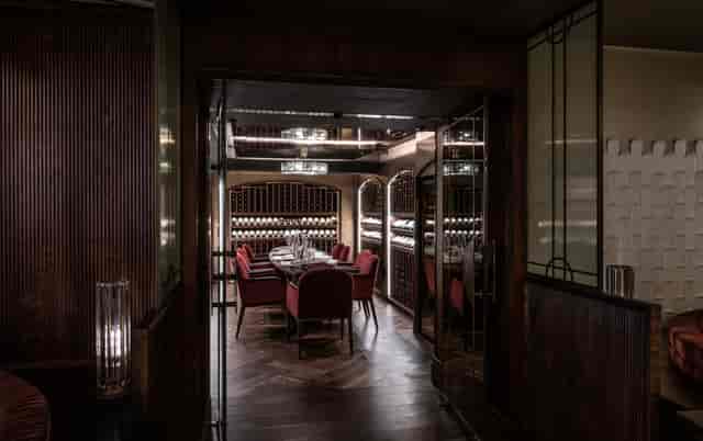 Elegant wine room at Savoy Grill, ideal for intimate gatherings and corporate dinners.