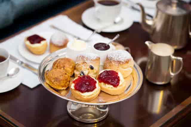 Elegant afternoon tea display with scones at The Stafford London for corporate events.