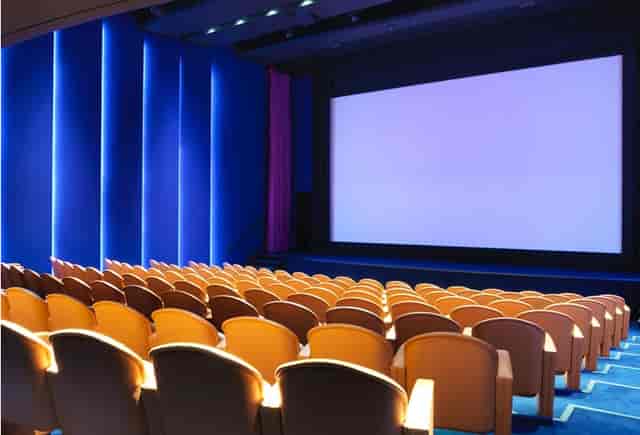 Modern auditorium at Ham Yard Hotel with spacious seating for presentations and screenings.