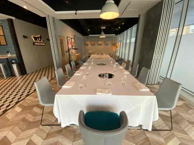 Whitechapel Think Factory meeting space with elegant table for corporate events and gatherings.