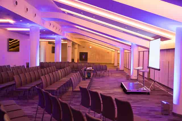 Modern event space at Allianz Stadium, Twickenham with sleek chairs for meetings and presentations.
