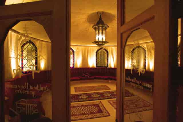 Elegant meeting space at The Tent, circular layout for collaboration, ideal for events.