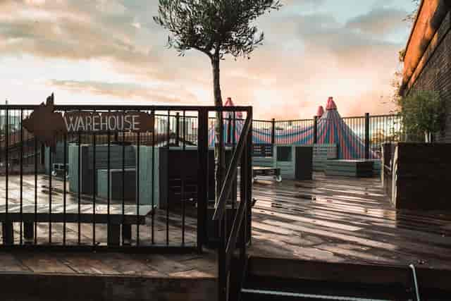 Roof Terrace at The Rainbow Venues, modern outdoor space with colorful tents for events.