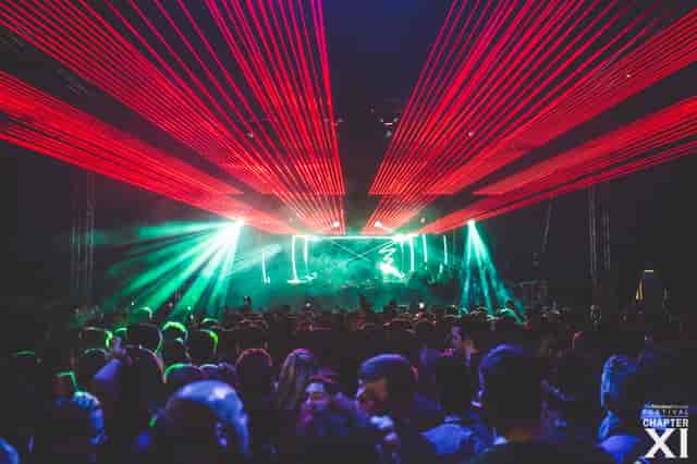 Vibrant concert atmosphere at The Rainbow Venues with dynamic lighting and engaged crowd.