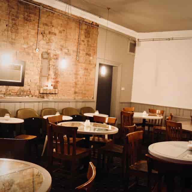Cozy meeting space at Dovedale Towers with rustic charm, ideal for workshops and gatherings.