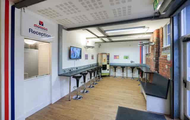 Modern training room reception with sleek seating for meetings and events.