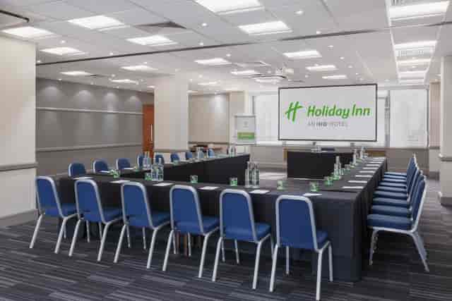 Meeting room at Holiday Inn Kensington with AV tech, ideal for corporate events.