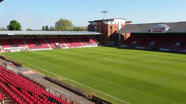 Olympic Suite at Leyton Orient FC, featuring a pristine football pitch for events.