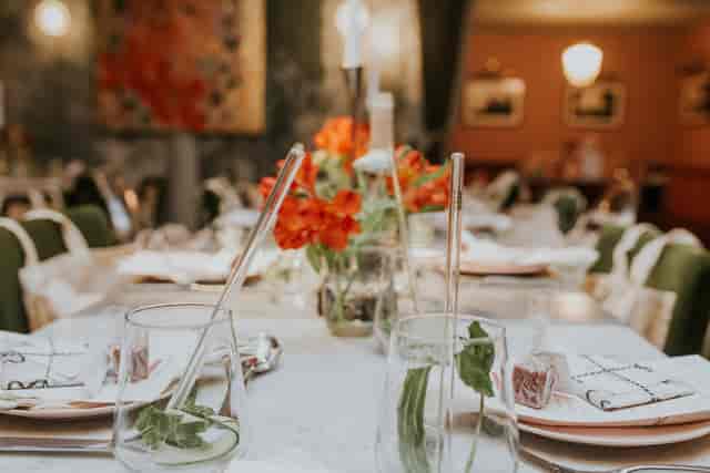 Elegant dining table setup for intimate events at Double Boat Hire, Darcie & May.