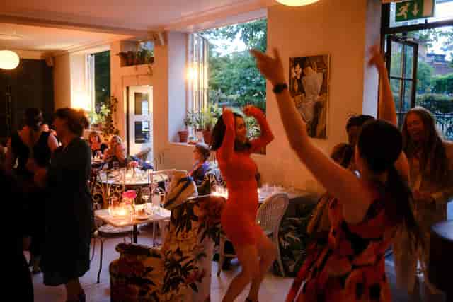Vibrant bar scene at Bourne & Hollingsworth for a lively social event and networking.