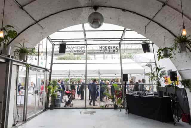 Chic event space at Springs Bar & Garden with large glass entrance for networking or celebrations.