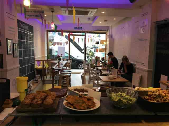 Cozy cafe in The Canvas with colorful decor for informal meetings and events