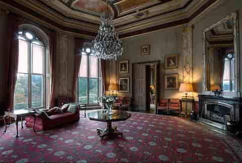 Elegant meeting room at Eastnor Castle with chandelier, ideal for events and networking.