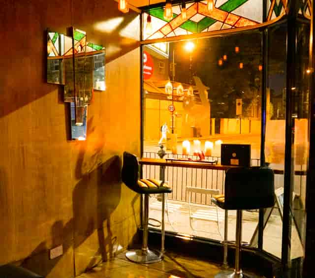 Cozy Main Bar in T-Bird with warm lighting, ideal for networking events and meetings.