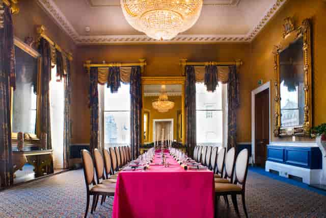 Elegant meeting space at Waterloo, featuring a pink tablecloth and natural light.