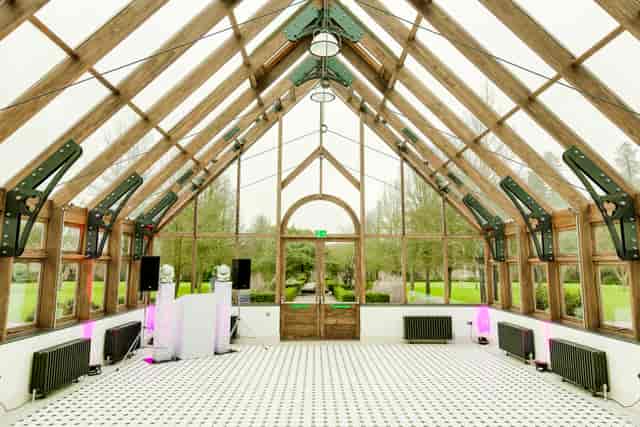 Garden Court at Hanbury Manor: elegant event space with natural light, ideal for weddings and meetings.