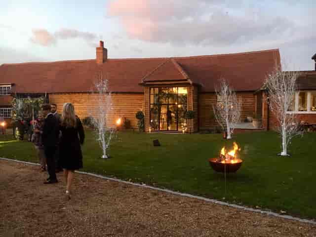 Charming outdoor venue at St Michaels Grange Barn with rustic decor for events.